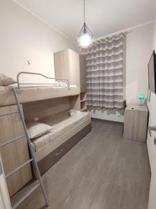 Posteľ alebo postele v izbe v ubytovaní Casa Violetta