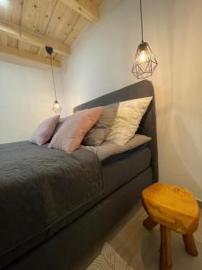 Postel nebo postele na pokoji v ubytování Gumikacsa Vendégház