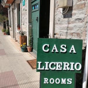 a sign that says casa libra rooms in front of a building at Casa Licerio in Samos
