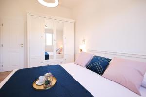 Cama ou camas em um quarto em Apartments Marta