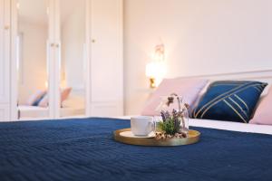 Cama ou camas em um quarto em Apartments Marta