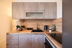 A cozinha ou cozinha compacta de Apartments Marta