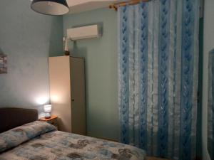 A bed or beds in a room at nAnA'