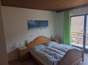 Postel nebo postele na pokoji v ubytování Ferienhof Unterführholzergut
