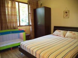 Postel nebo postele na pokoji v ubytování Yellow villa