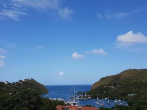 a view of a harbor with boats in the water at Casa Vista in Marigot Bay