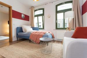 En eller flere senge i et værelse på FULL HOUSE Studios - Little Paris Apartment - Nespresso + WiFi inkl.