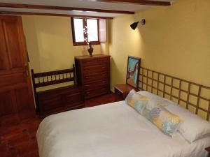 Posteľ alebo postele v izbe v ubytovaní Casa Cofrades