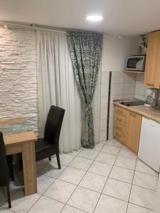Kuchyň nebo kuchyňský kout v ubytování Old Town Apartment Split