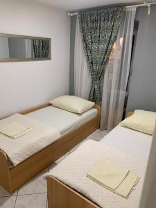 Postel nebo postele na pokoji v ubytování Old Town Apartment Split