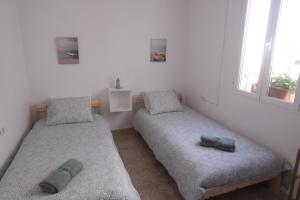 Postel nebo postele na pokoji v ubytování La Regaora apartamento