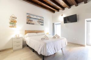 Postel nebo postele na pokoji v ubytování Allo Apartments Plateros Centro Jacuzzi Comunitario