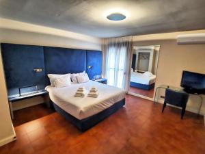 Postel nebo postele na pokoji v ubytování Hotel Ronda Valley