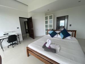 Säng eller sängar i ett rum på villa Siam View Samui