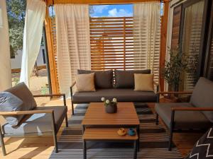 Posezení v ubytování Mobile Home Limona