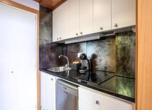 Una cocina o zona de cocina en Apartamento Edificio la Masía