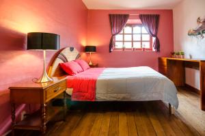 Giường trong phòng chung tại Dragonfly Hostels Cusco