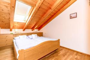 Postel nebo postele na pokoji v ubytování Haus am Balsberg