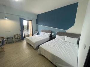 Postel nebo postele na pokoji v ubytování Chikubi Homestay