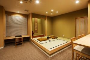 a meditation room with two meditation mats on the floor at Onsen no yado Gion Maisen Bettei in Kyoto