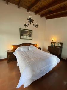 מיטה או מיטות בחדר ב-Parador de Antigua