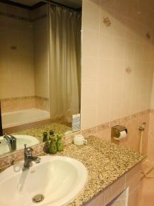 Ett badrum på Hermitage Hotel Korat-SHA