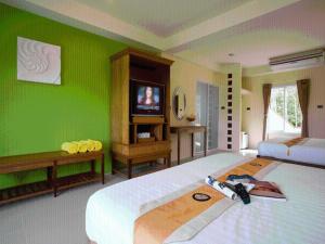 Postel nebo postele na pokoji v ubytování Para Resort