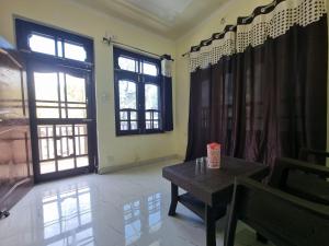 Χώρος καθιστικού στο NH 47 Rooms