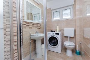 Koupelna v ubytování Apartment Marina