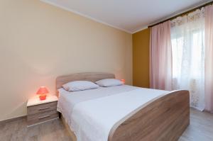 Postel nebo postele na pokoji v ubytování Apartment Marina