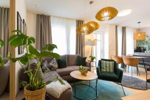 Posezení v ubytování Quartier am Kurpark, App 12 Gartenhaus