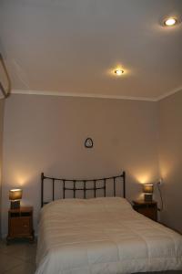 Ένα ή περισσότερα κρεβάτια σε δωμάτιο στο One Bedroom Villa
