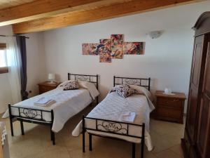 Postel nebo postele na pokoji v ubytování Villa Stella - Salento Puglia