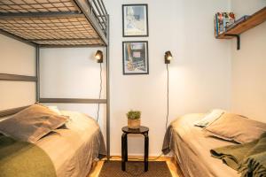 Кровать или кровати в номере Ruka Etelärinne Lodge