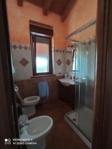 Fotografia z galérie ubytovania Gli ulivi,casa tra Pula e Villa San Pietro Q3307 v destinácii Villa San Pietro + 3 fotografie