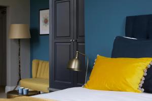 Кровать или кровати в номере Sentry Mead Hotel