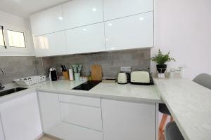 Η κουζίνα ή μικρή κουζίνα στο Benalmadena Jupiter - SunSea Apartments