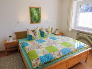 Ένα ή περισσότερα κρεβάτια σε δωμάτιο στο Apartment Haus Ganter by Interhome