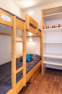 a bunk bed room with two bunk beds at Apartment Les Lauzières-9 by Interhome in Val Thorens