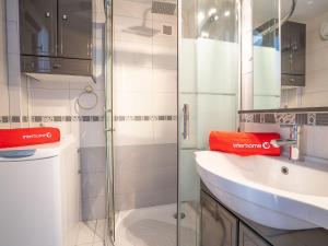 a bathroom with a shower and a sink at Holiday Home Le Hameau des Bougainvilliers by Interhome in Saint-Cyprien-Plage