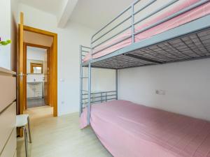 Ένα ή περισσότερα κρεβάτια σε δωμάτιο στο Apartment Terecel Salou-15 by Interhome