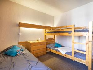 Postel nebo postele na pokoji v ubytování Apartment Hauts De Chaviere A13 by Interhome