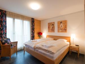 Postel nebo postele na pokoji v ubytování Apartment Silberhorn Apt- DW by Interhome