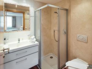 a bathroom with a shower and a sink at Apartment Ladis-6 by Interhome in Ladis