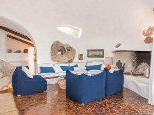 אזור ישיבה ב-Holiday Home Roccia di Volpe by Interhome
