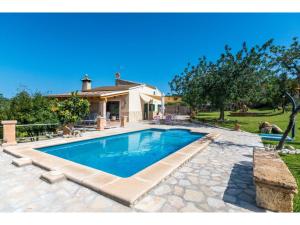 a swimming pool in the backyard of a house at Holiday Home Villa Lavanda by Interhome in Alcudia