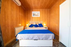 Llit o llits en una habitació de Cassola Del Priorat