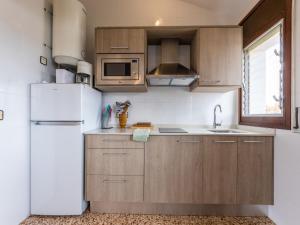 Η κουζίνα ή μικρή κουζίνα στο Apartment Drassanes III by Interhome