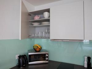Kuchyň nebo kuchyňský kout v ubytování Apartment Twin Studio by Interhome