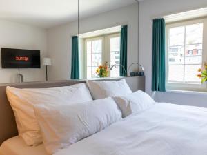 Postel nebo postele na pokoji v ubytování Apartment Twin Studio by Interhome